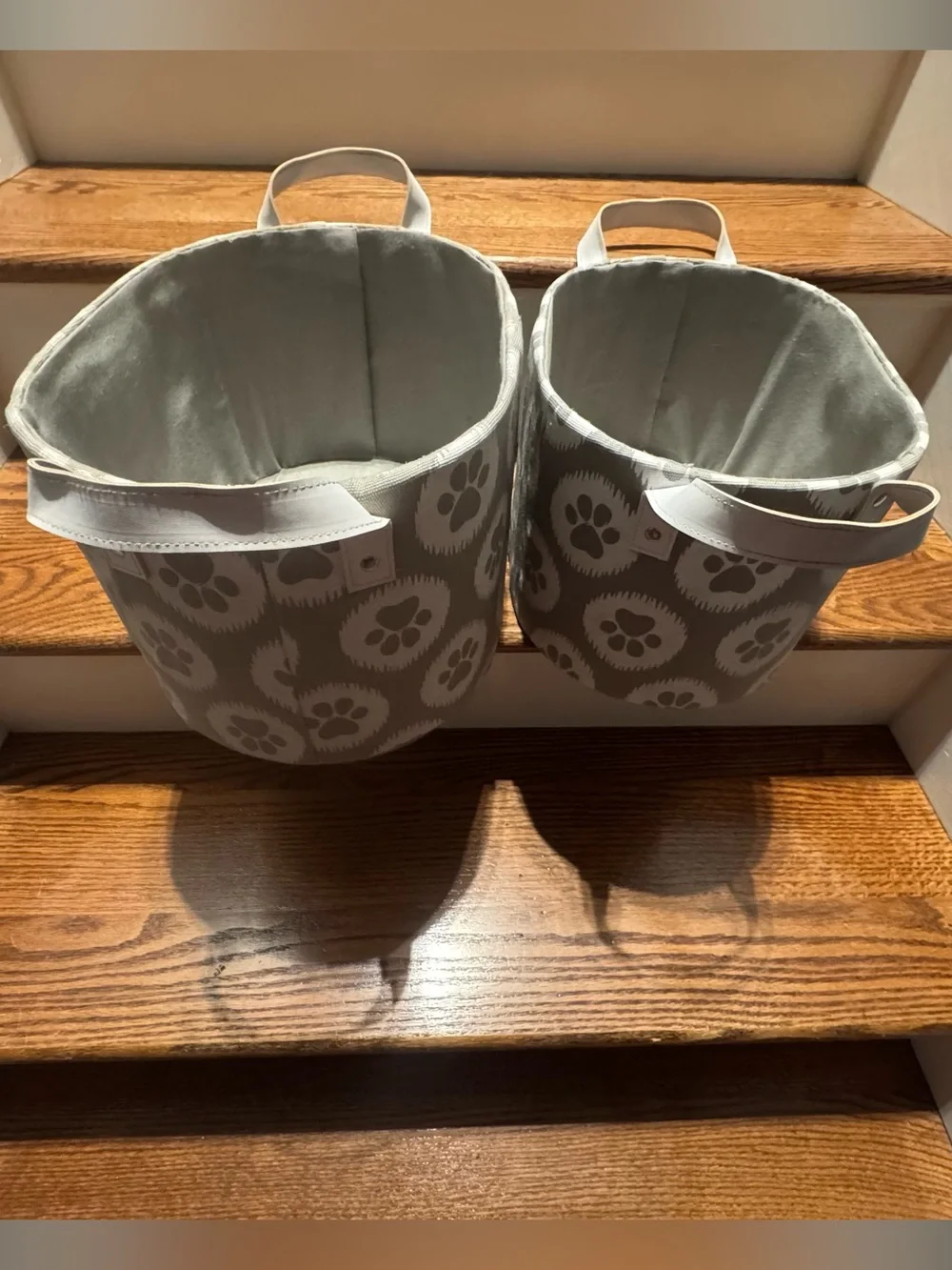 Set of gray & white paw print canvas storage baskets with white leather handles
